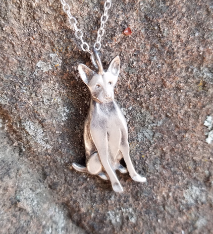 Hand Carved Dog Pendant